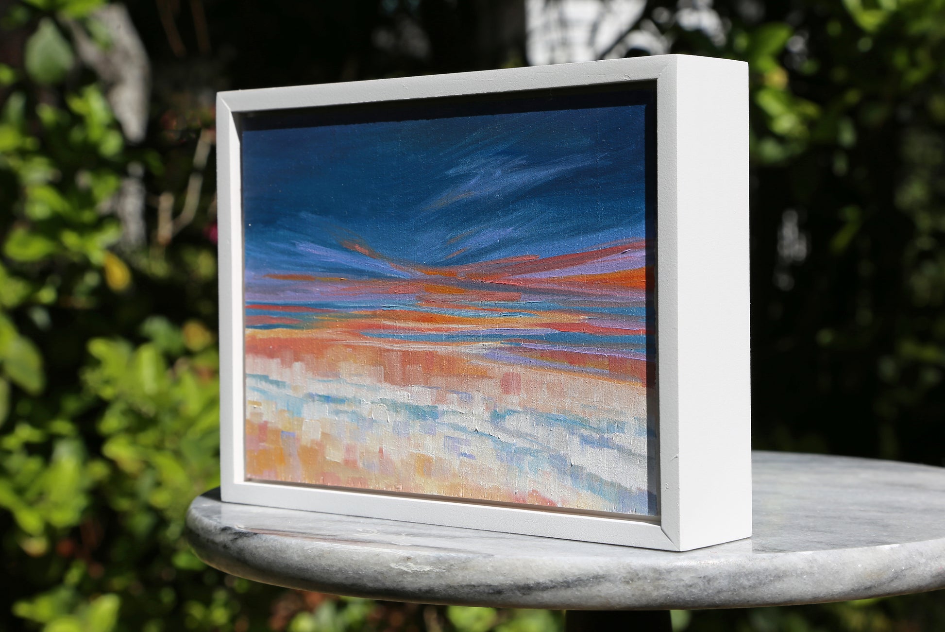 As Far offers a stunning addition to any home decor with its abstract original oil painting in bright sunset colors. Ready to hang in a white frame, this small yet impactful piece adds a touch of fine art to your space.